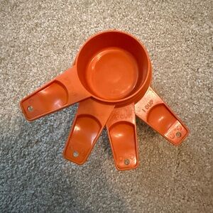 Vintage Tupperware orange plastic Measuring Cups Set